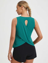 Teal Baleaf UPF 50+ tank top with crossover open back design. #color_Teal Green
