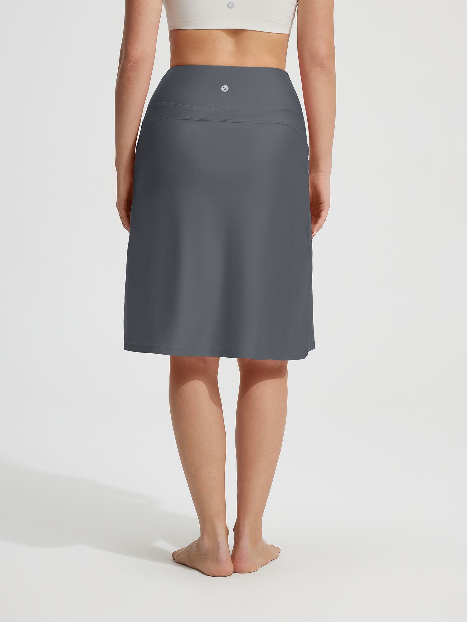 Back view: Baleaf dark grey 23" UPF 50+ high-rise swim skirt with pockets #color_Dark Gray