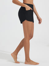 Black Baleaf UPF 50+ high-rise board shorts with 3 pockets. #color_Black