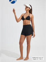 Baleaf women's black UPF 50+ high-rise 3" board shorts with 3 pockets, playing volleyball.