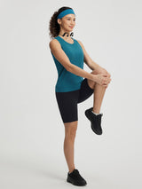 Baleaf Ultra-Soft Workout Crewneck Tank Top on model performing a stretch. #color_Deep Blue