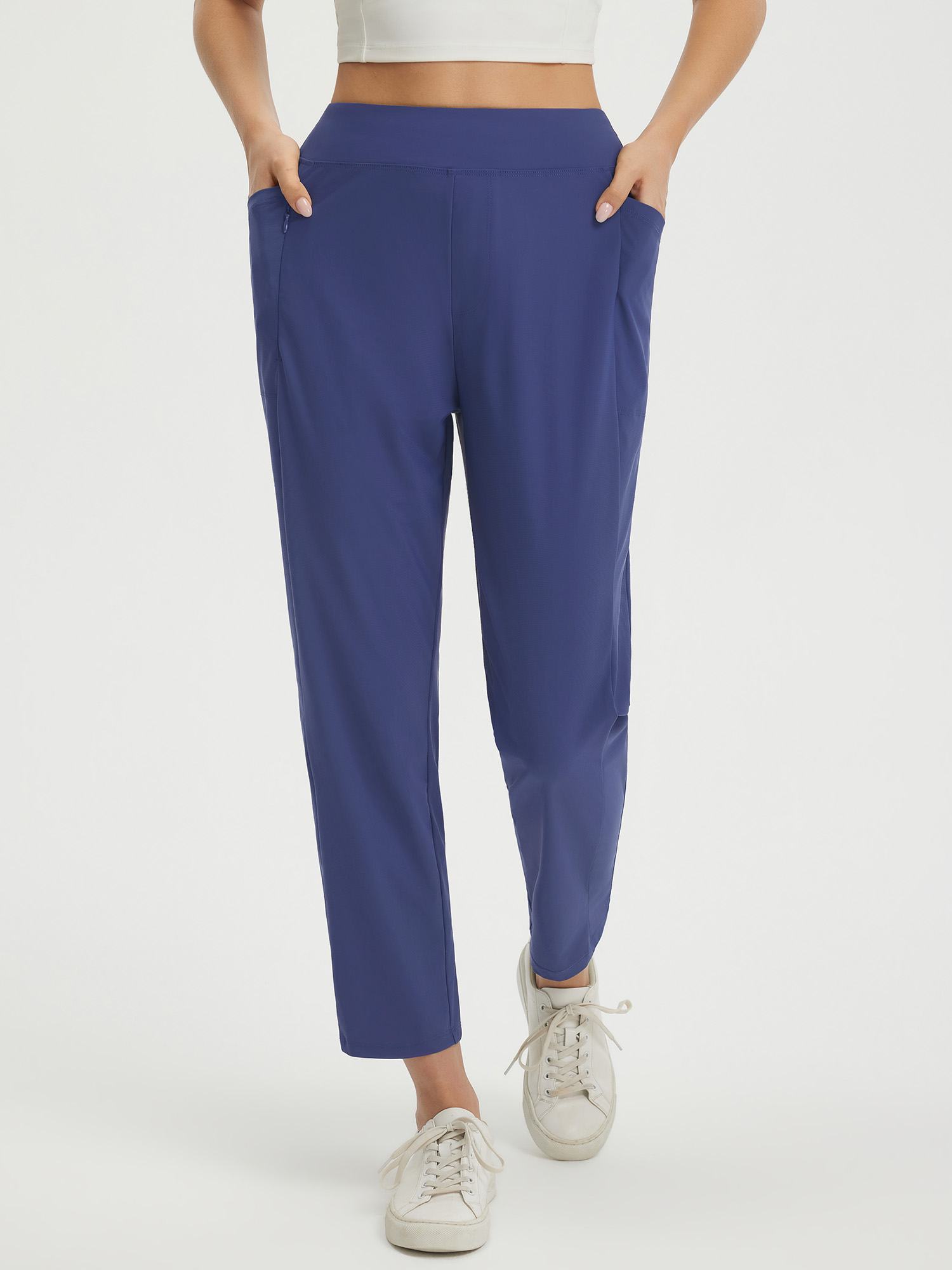 Blue petite ankle length pull-on travel pants with pockets #color_Navy Blue