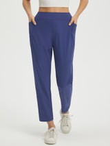 Blue petite ankle length pull-on travel pants with pockets #color_Navy Blue