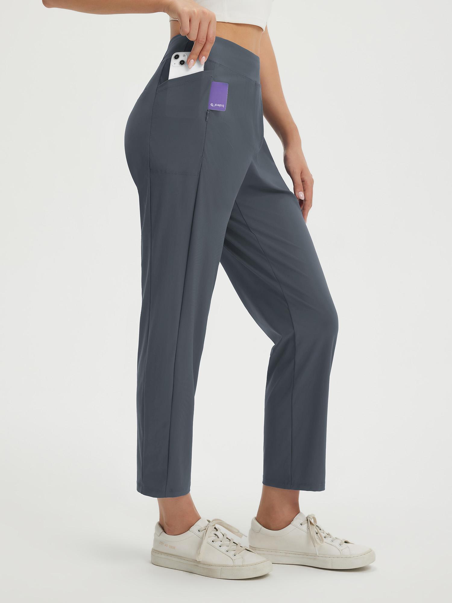 Petite dark grey ankle-length pull-on travel pants with phone in side pocket and zip detail. #color_Dark Gray