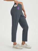 Petite dark grey ankle-length pull-on travel pants with phone in side pocket and zip detail. #color_Dark Gray