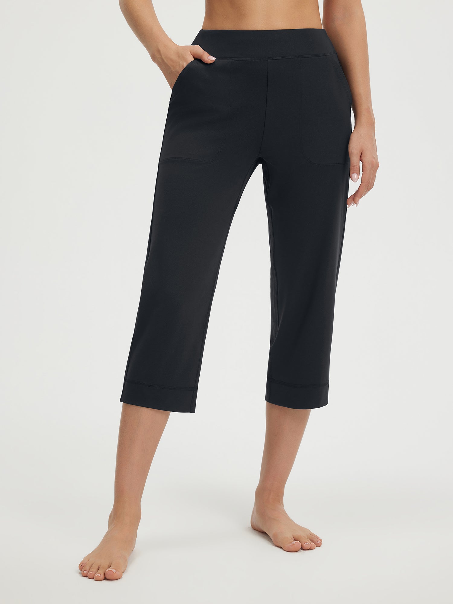 Baleaf black 21" high-rise stretchy straight-leg capri pants with pockets. #color_Black