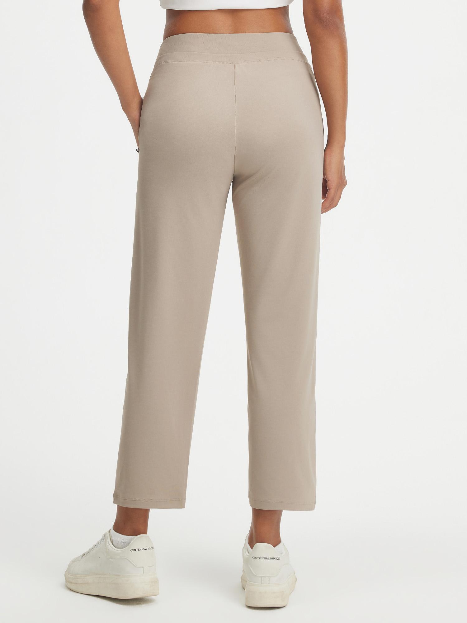 Baleaf ultra-soft high-rise 25" pants in beige, back view, with zipper pockets. #color_Khaki