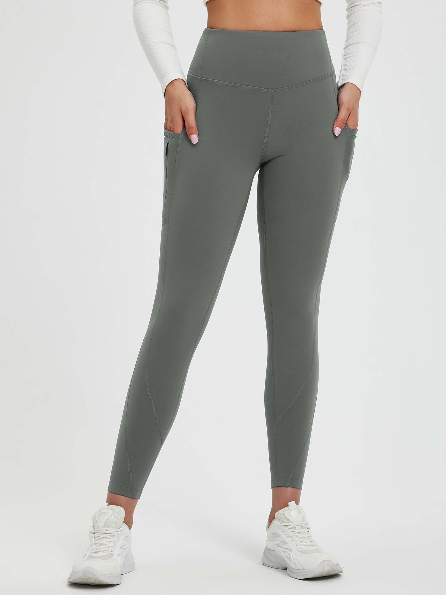 Grey fleece-lined 25" thermal yoga leggings with zipper pockets & high waist. #color_Dark Gray