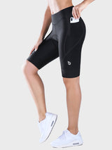 Women's black UPF 50+ padded cycling shorts, 9-inch inseam, side phone pockets. #color_Black