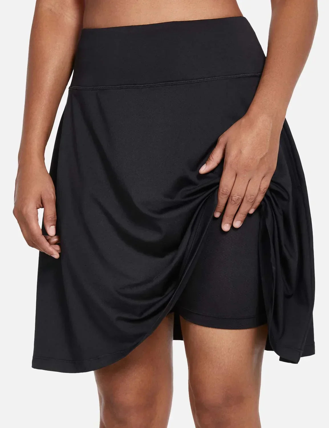 Black Laureate UPF50+ Pleated Skort with inner shorts and pockets. #color_Black