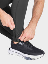 Men's water-resistant fleece tights, zippered ankle detail. #color_Black