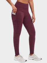 Burgundy high-waisted brushed fleece leggings with functional side pocket for phone. #color_Wine Red