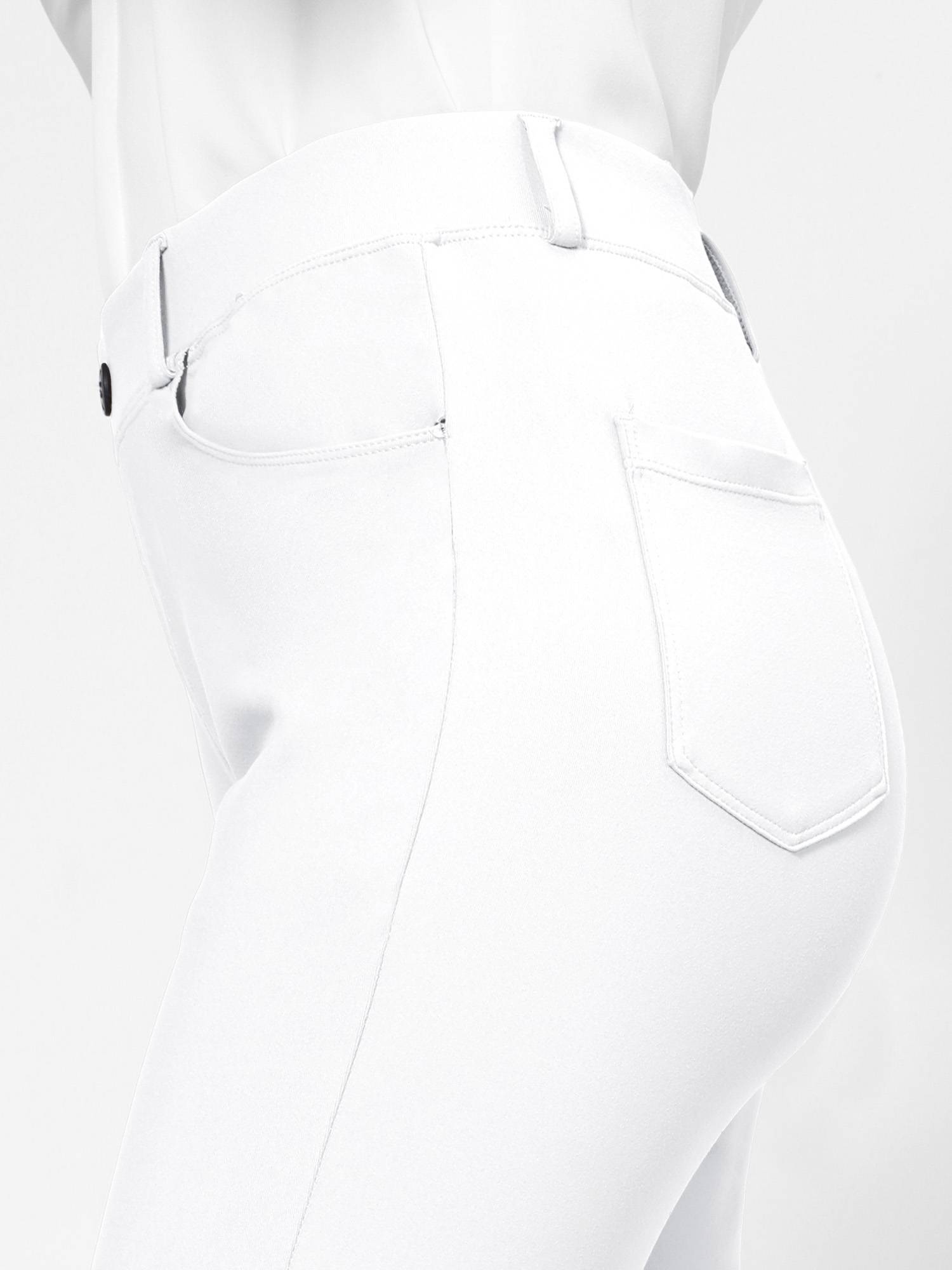 White Yoga Micro Work Flared Pants: detailed view of waistband, belt loops, and back pockets. #color_White