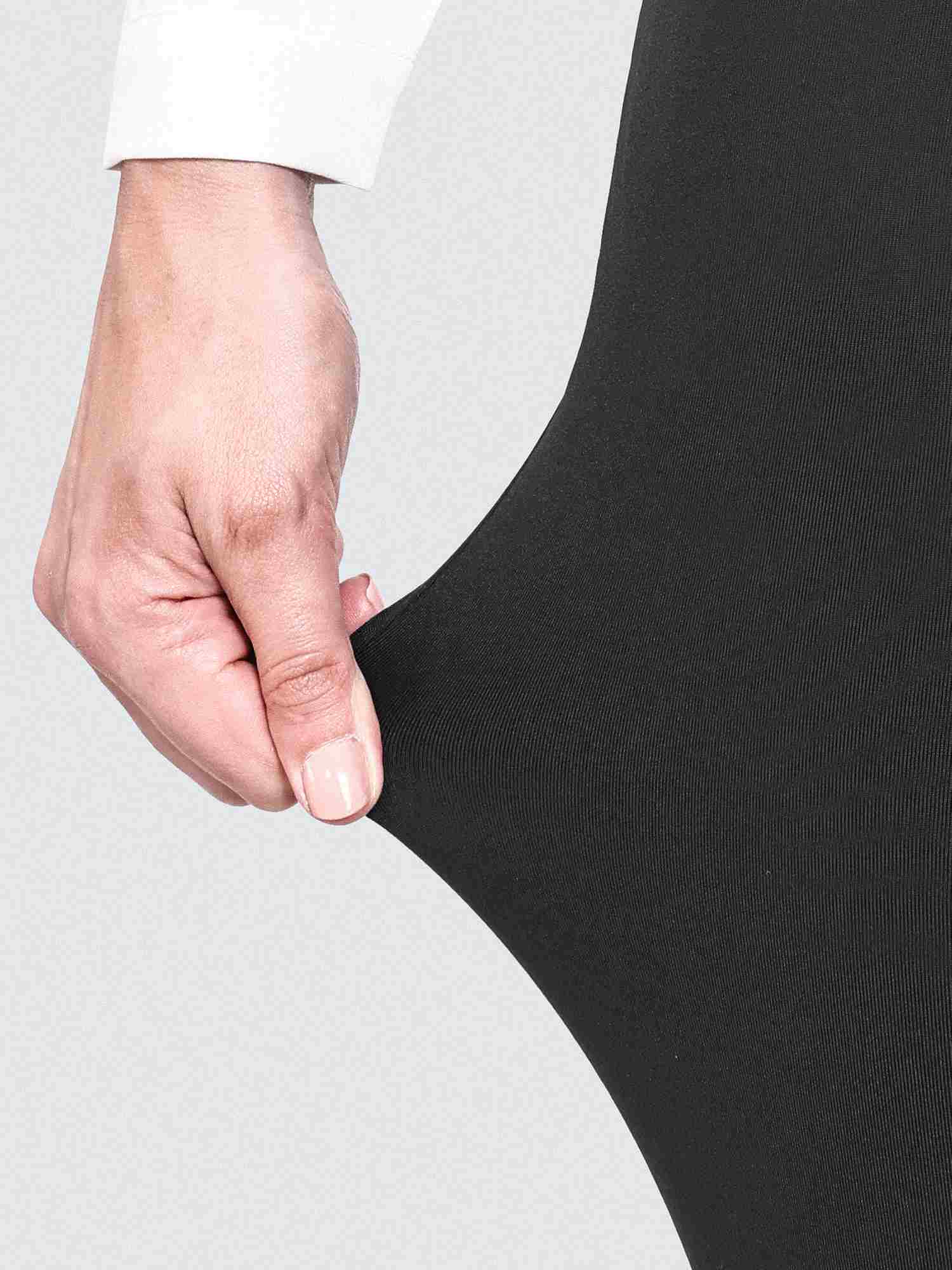 Yoga work flared pants: black fabric shows 4-way stretch #color_Black