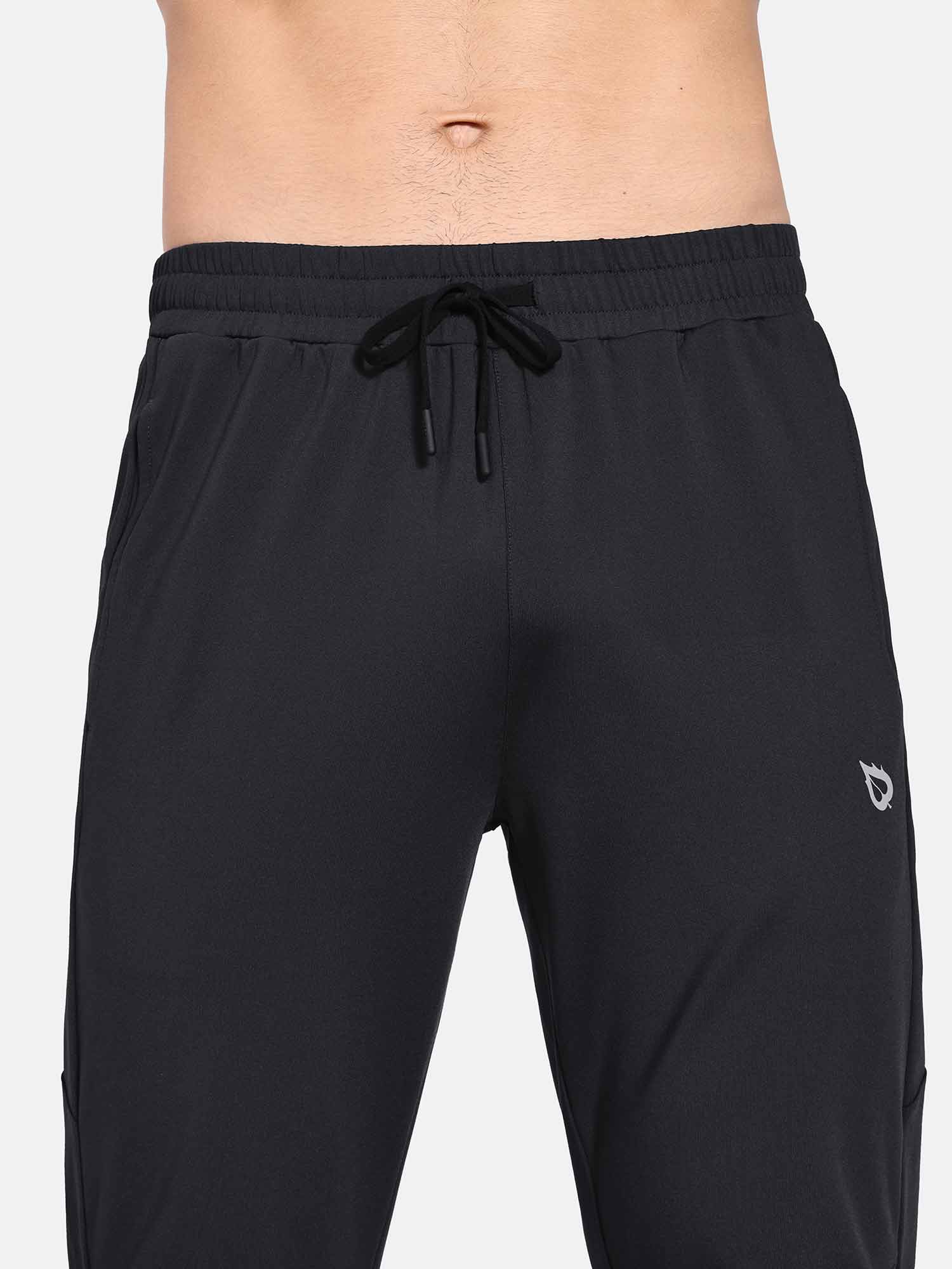 Close-up of elastic waistband with adjustable drawstring on Baleaf men's black fleece lined pants