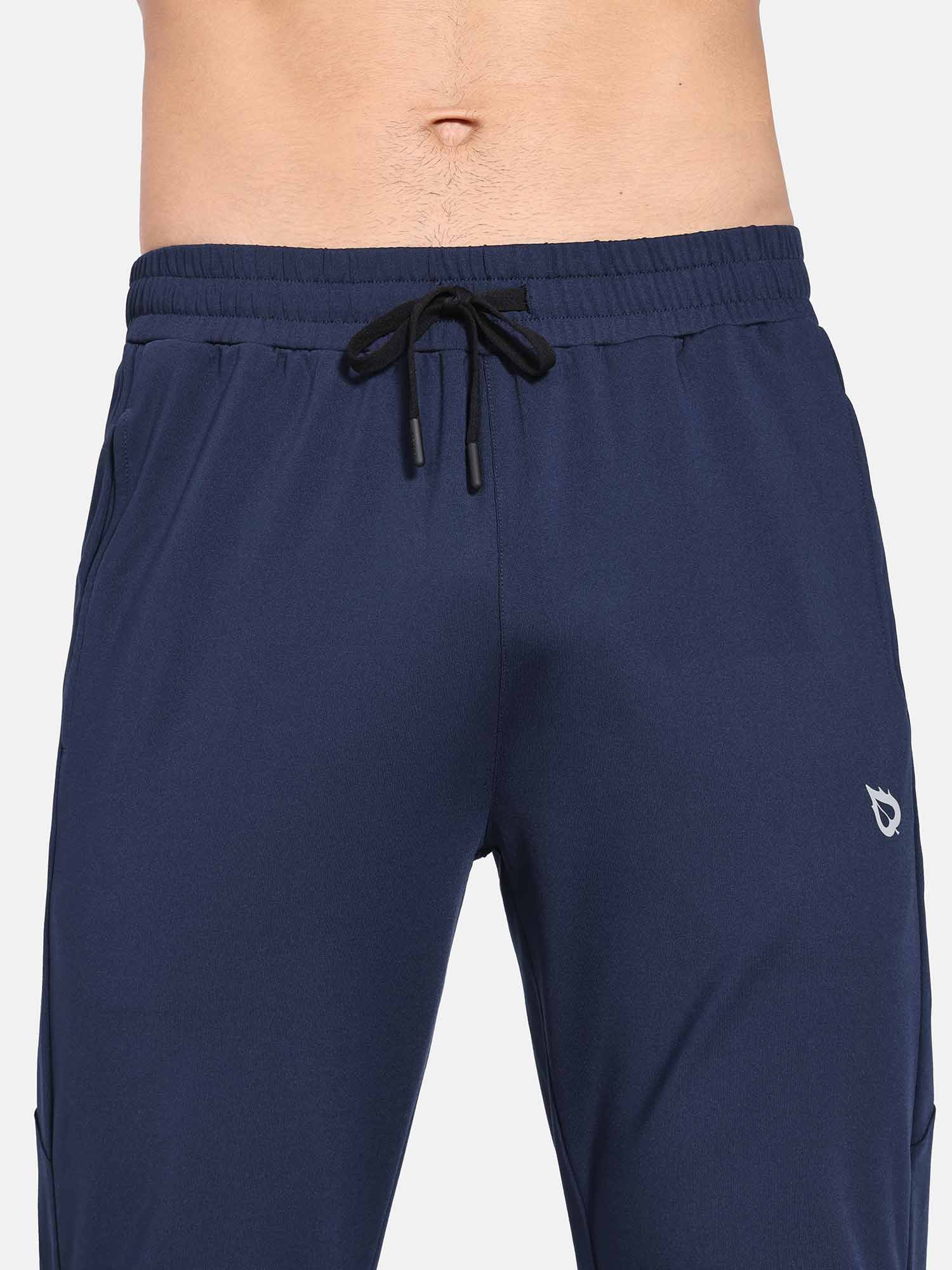 Men's navy fleece-lined water-resistant straight leg pants detail. #color_Navy Blue