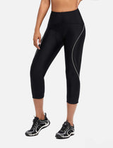 Black high-waisted padded cycling capris for women, 3/4 length with reflective accents. #color_Gray