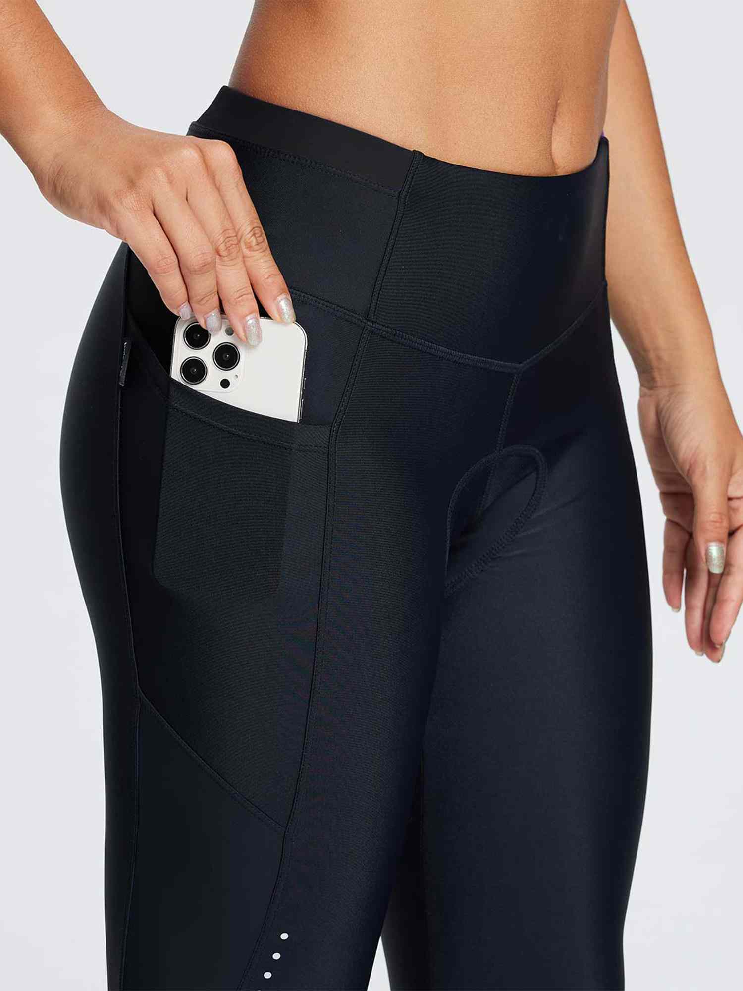 Women's black padded cycling tights with side utility pocket #color_Black