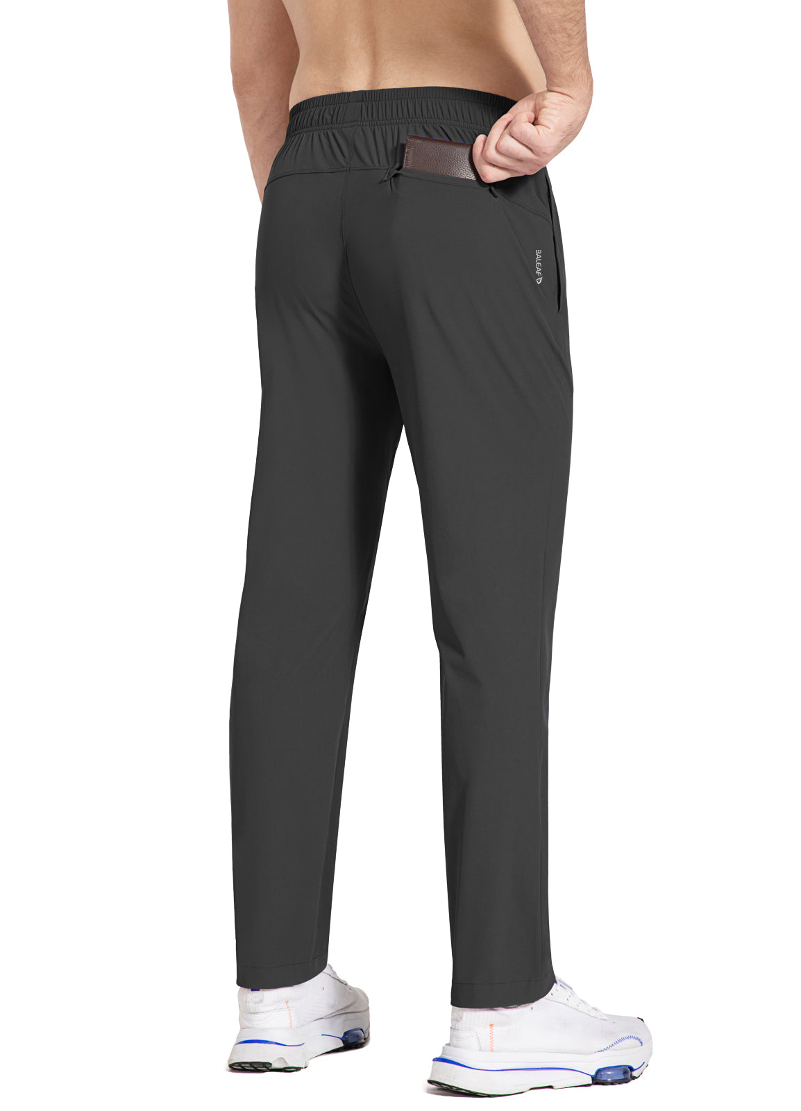 Men's dark grey BALEAF tapered running pants, elastic waist and back pocket detail. #color_Black