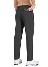 Men's dark grey BALEAF tapered running pants, elastic waist and back pocket detail. #color_Black