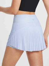 Women's high-waisted running skirt with flowy pleated hem in light blue. #color_Light Blue
