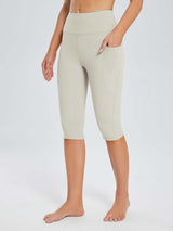 Laureate women's light beige pocketed yoga capris with high waist and side pockets. #color_Light Brown