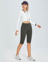 Laureate women's dark grey pocketed yoga capris, high-waisted with side slits and phone pockets.