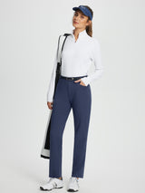 Women's navy fleece-lined straight-leg golf pants with white golf top and visor #color_Navy Blue