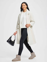 Black thermal fleece high-waist yoga leggings with tummy control, styled for winter. #color_Black