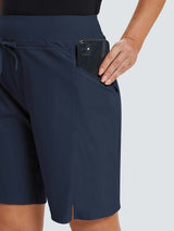Navy blue women's hiking bermuda shorts with a smartphone being placed into a zippered pocket. #color_Navy Blue