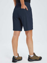 Women's navy blue 9-inch quick-dry hiking Bermuda shorts with zippered pockets #color_Navy Blue