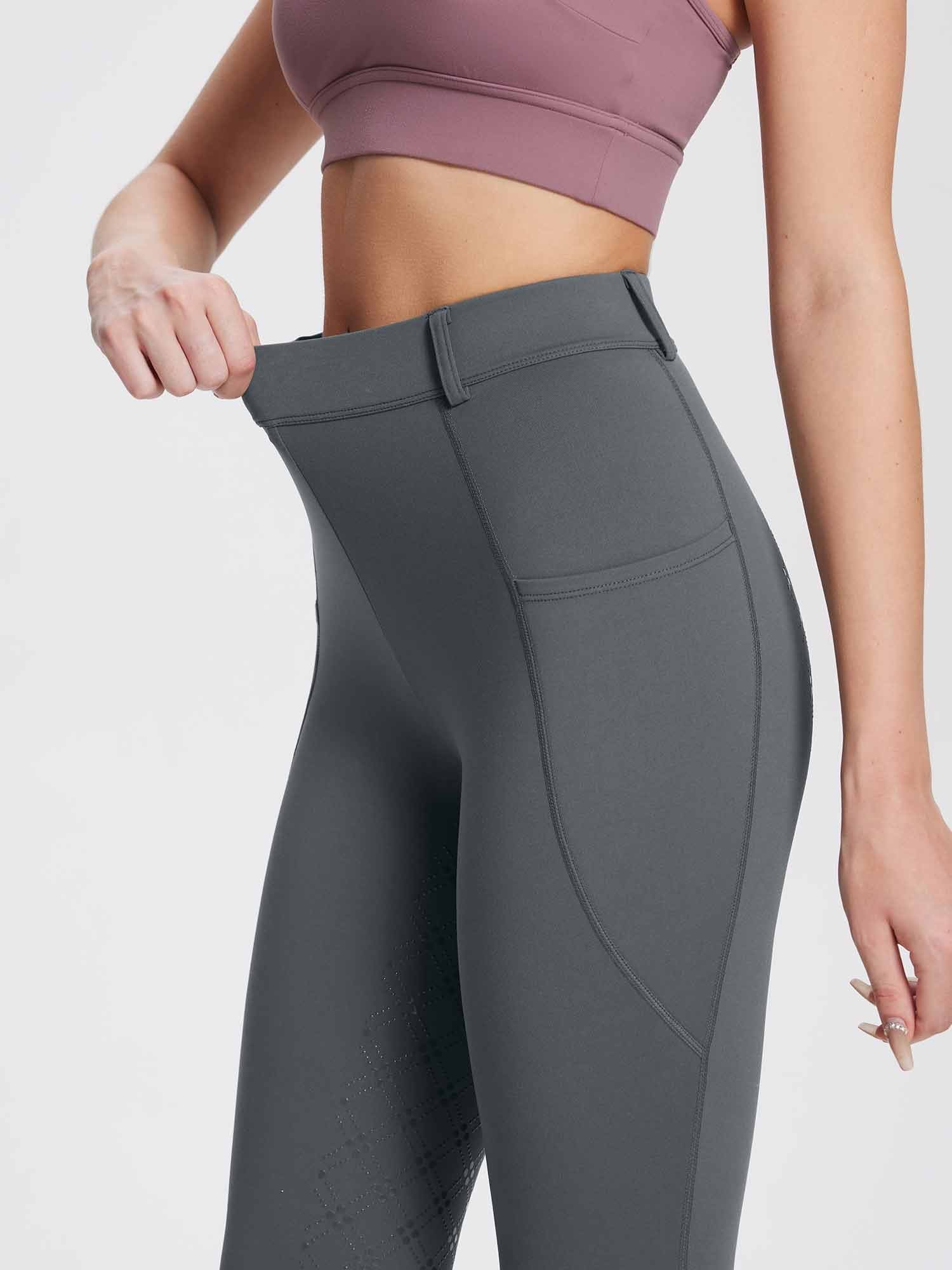 Women's grey fleece equestrian breeches with silicone grip pattern and side pocket. #color_Gray