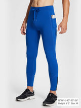 Men's blue fleece-lined running tights: drawstring, phone pocket, ankle zips, reflective.