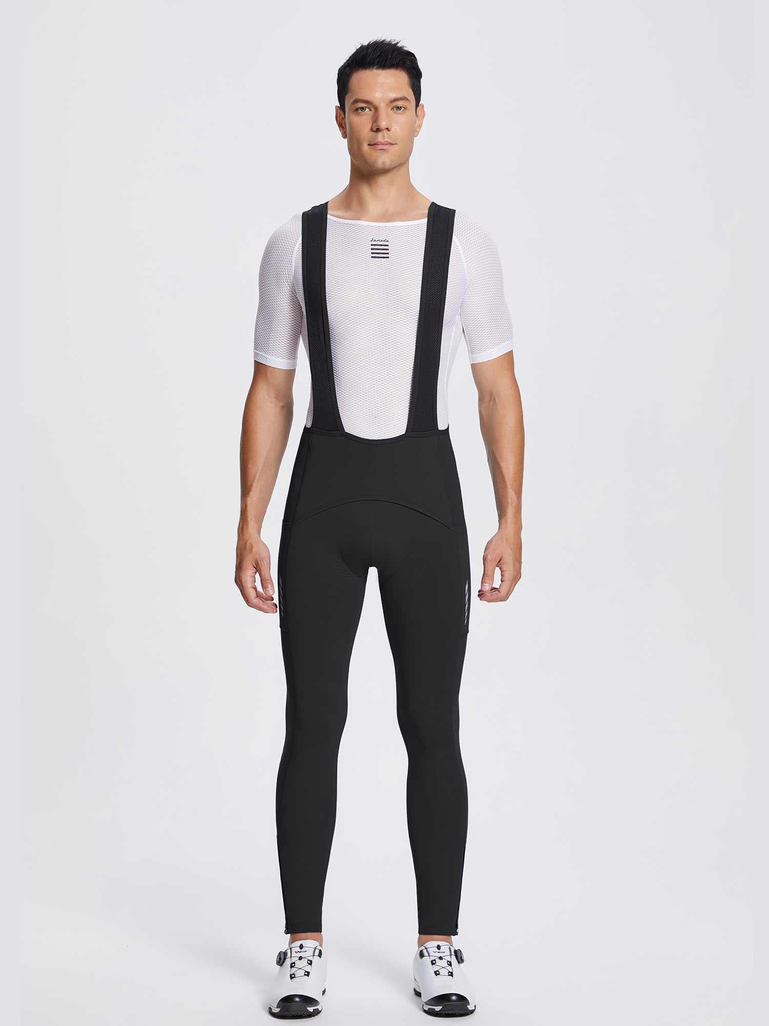 Black men's fleece bib cycling tights featuring padded design, worn on a model. #color_Black