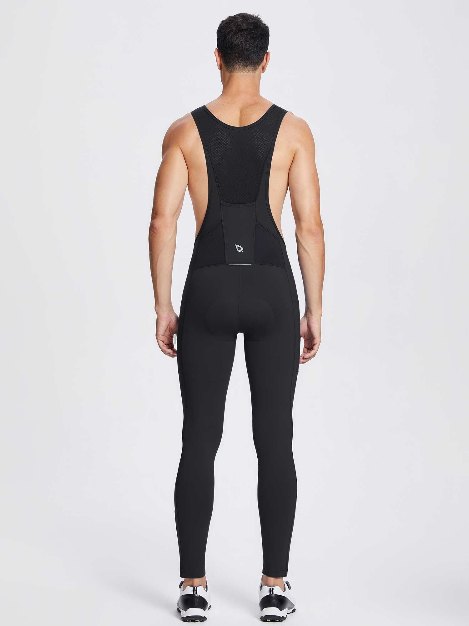 Men's black fleece bib cycling tights back view with reflective logo and side pockets. #color_Black