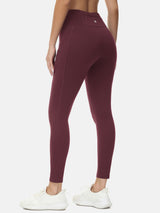 Burgundy fleece-lined running leggings with high waist and utility pockets. #color_Wine Red