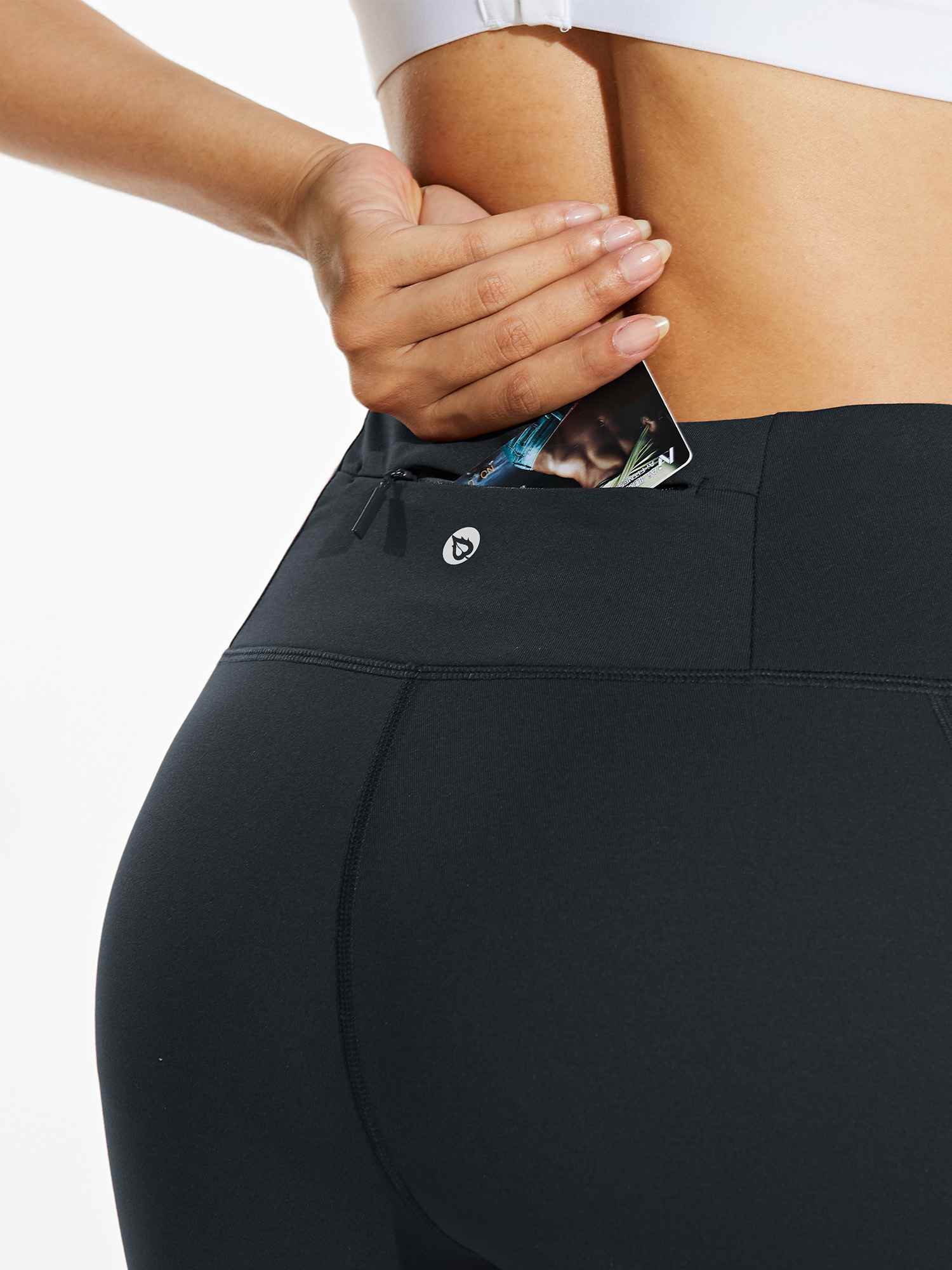 Black fleece-lined running leggings with high waist and secure zippered back pocket. #color_Black