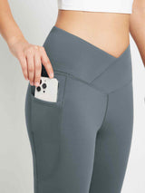Grey crossover waist fleece flare pants with functional phone pocket. #color_Dark Gray