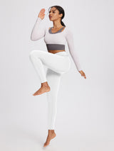 White thermal fleece lined yoga leggings with supportive high waistband for tummy control. #color_Black/White