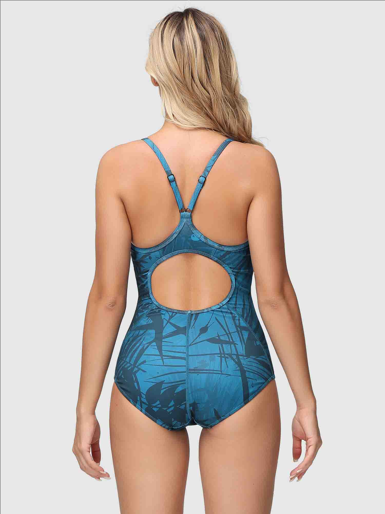 Blue women's one-piece swimsuit with tropical leaf print, keyhole back, and adjustable straps. #color_Peacock