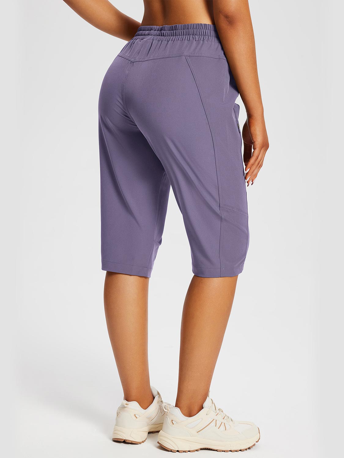 Purple UPF50+ pocketed capris for outdoor comfort. #color_Montana Grape