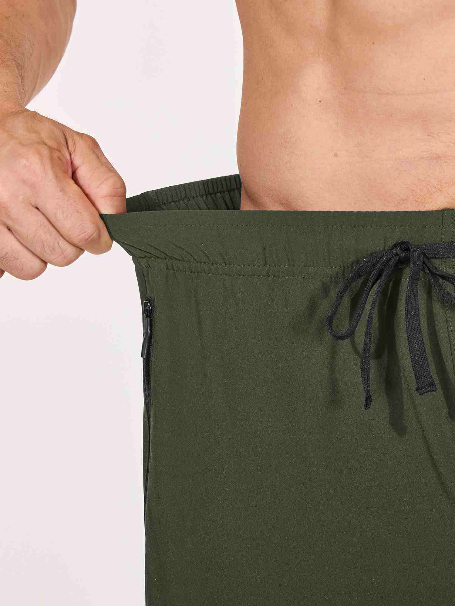Men's army green UPF 50+ quick-dry hiking pants with elastic waistband, drawstring, and zippered pockets. #color_Army Green