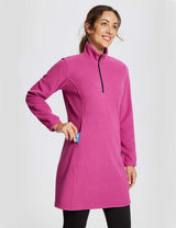 Woman wearing a pink long-sleeve quarter zip thermal tunic dress with a kangaroo pocket. #color_Violet Rose