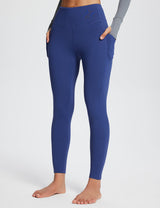 Laureate high-rise thermal leggings in blue with side pockets.
