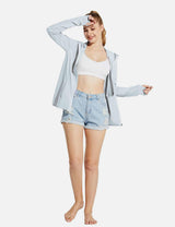 Laureate Women's UPF 50+ Cooling Hooded Zip-Up Jacket in light blue, featuring thumbholes and a relaxed fit.