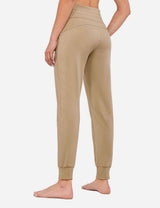 Tan Baleaf Laureate Thermal Tapered Joggers with cuffed hem, side view. #color_Doeskin