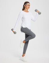 Woman in white UPF 50+ long sleeve shirt and grey leggings holding dumbbells #color_Lucent White