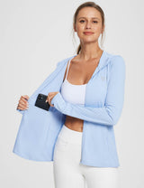 Light blue UPF 50+ hooded jacket on woman zipping open to reveal inner pocket with phone. #Baleaf